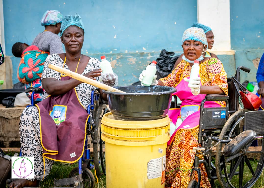 Women including persons with disabilities participating in a soap-making program